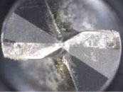 超微結晶ダイヤモンドコーティング 3,600穴加工後の損耗写真